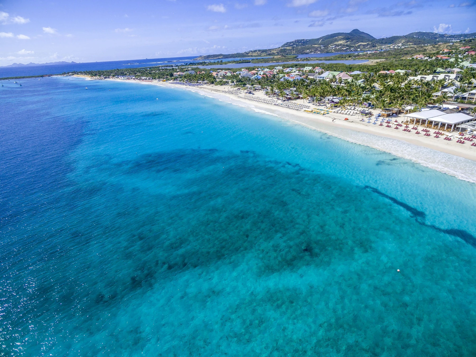 Aerial view of Orient Bay and turquoise water in Saint Martin